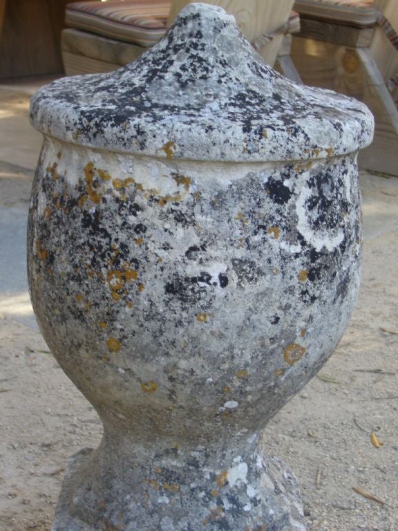 Vintage mottled stone urn from Southern France with a beautiful patina.

  