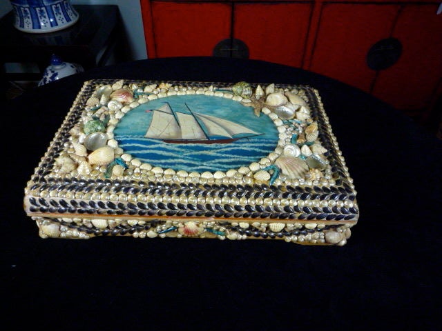A Shell Encrusted Box with Marine Painting