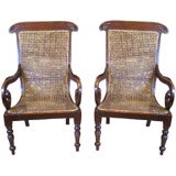 Used Pair of Mahogany British Colonial Cane Chairs