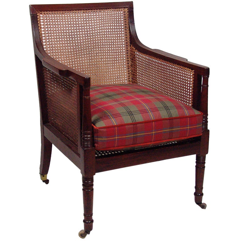 A Late Regency Mahogany and Caned Library Chair