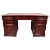 A Mahogany Partner's Desk with Inset Leather Top by Lesage