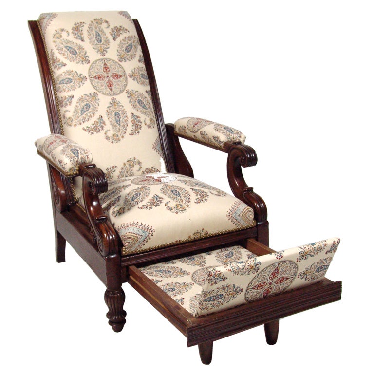 A Late Empire Armchair with Foot Rest and Paisley Fabric