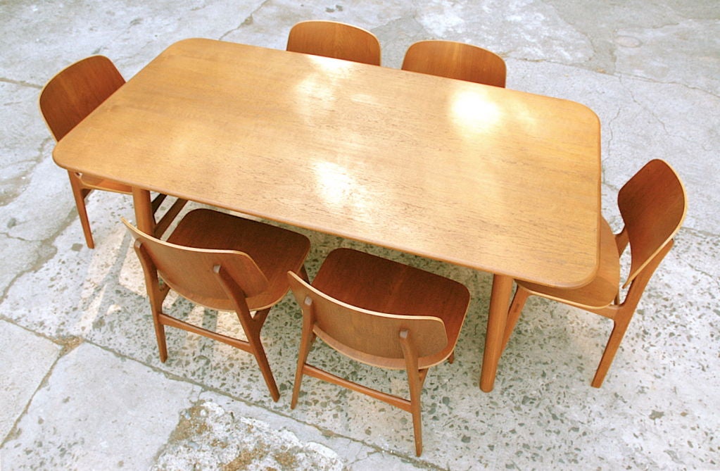 Table and 6 Chairs by Borge Mogensen
Table: 37”dp 70’w 30”ht, All Teak
Chairs: 30.5”ht 17”seat ht 20”w 18”dp
Rare Mid Fifties Suite, Early Example of Mogensen's distinctive style.  A more muscular, less flamboyant sensibility than Finn Juhl or
