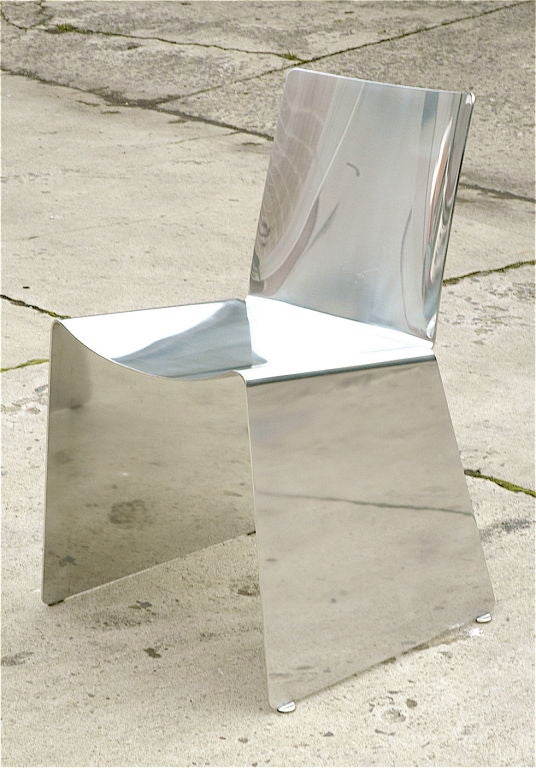 Xavier Lust for Elixir, Brussels, Belgium 1999
Chair formed from one sheet of Mirror Polished Aluminum
Limited Edition Studio work entitled,“T Chair Polish.