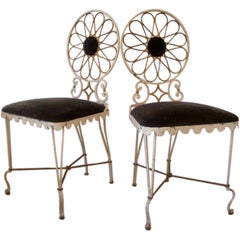 A pair of chairs by Gilbert Poillerat