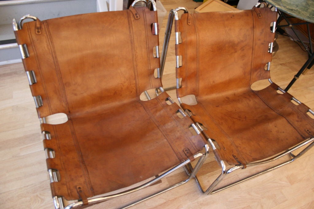 A pair of leather bachelor chairs For Sale 1