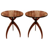 A pair of round top side tables