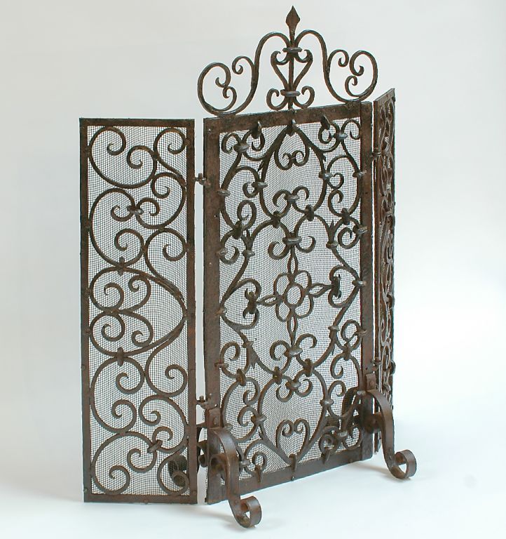 Hand forged iron fireplace screen <br />
Center panel 17 1/2