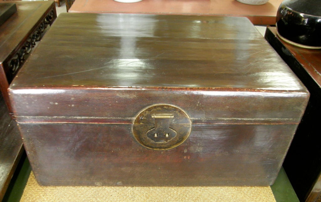 Chinese 19th century leather wedding trunk with its original surface and bronze hardware. The trunk makes a great coffee or end table.
