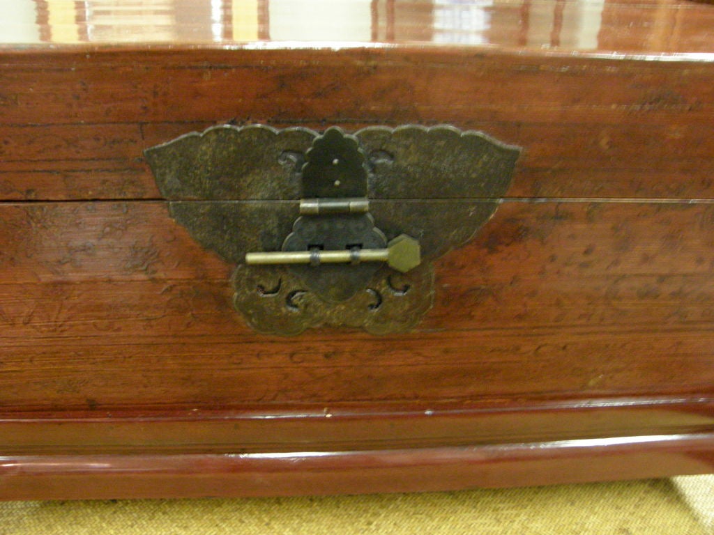 Chinese 19th century red lacquer country trunk coffee table