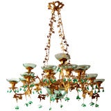 A gilt bronze and pressed metal Napoleon 111 16 light chandelier