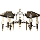 An unusual Charles X style tole, brass, and iron chandelier