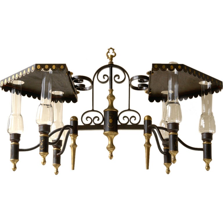 An unusual Charles X style tole, brass, and iron chandelier