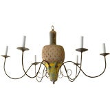 Chandelier with a  natural and painted  wood antique bowling pin