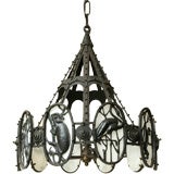 An unusual Arts and Crafts iron chandelier