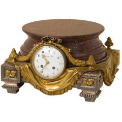 Red marble and gilt bronze clock