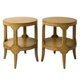 Pair of round leather covered tables