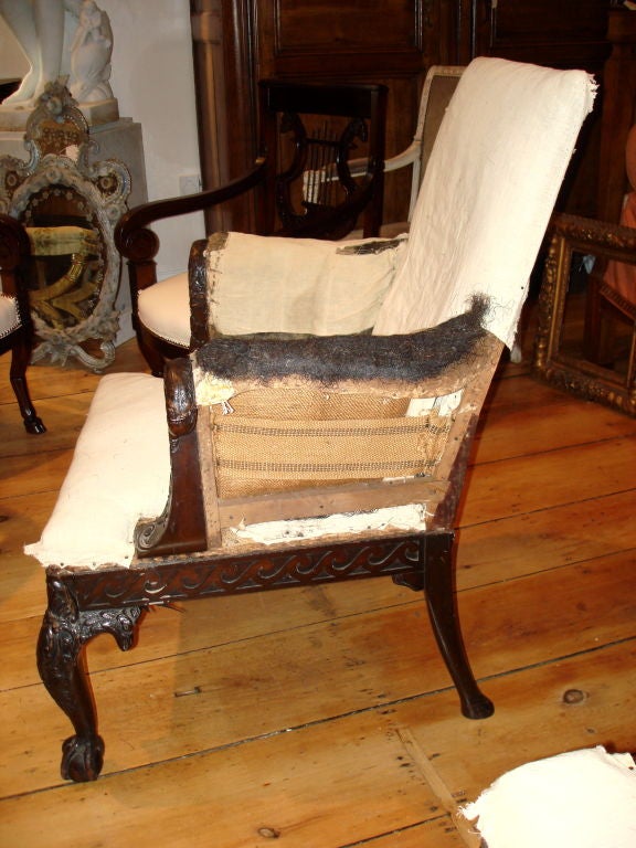 Rare and Exquisite Pair of Georgian Eagle Motif Library Arm Chairs.  Running dog carving in frieze.  As seen in 