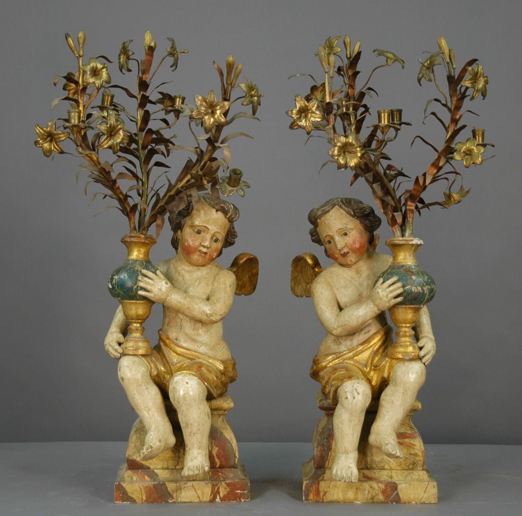 Pair of Painted Winged Angel Candelabra