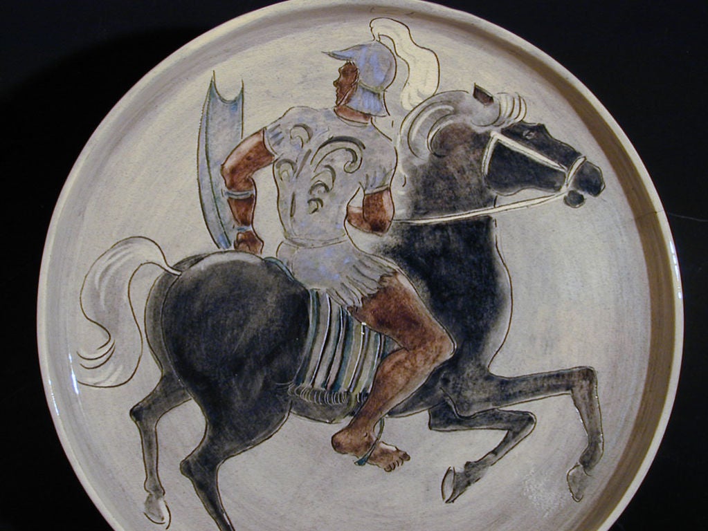 This extremely rare tray by Pat and Covey Stewart depicts a knight on horseback, varying from the more familiar 
