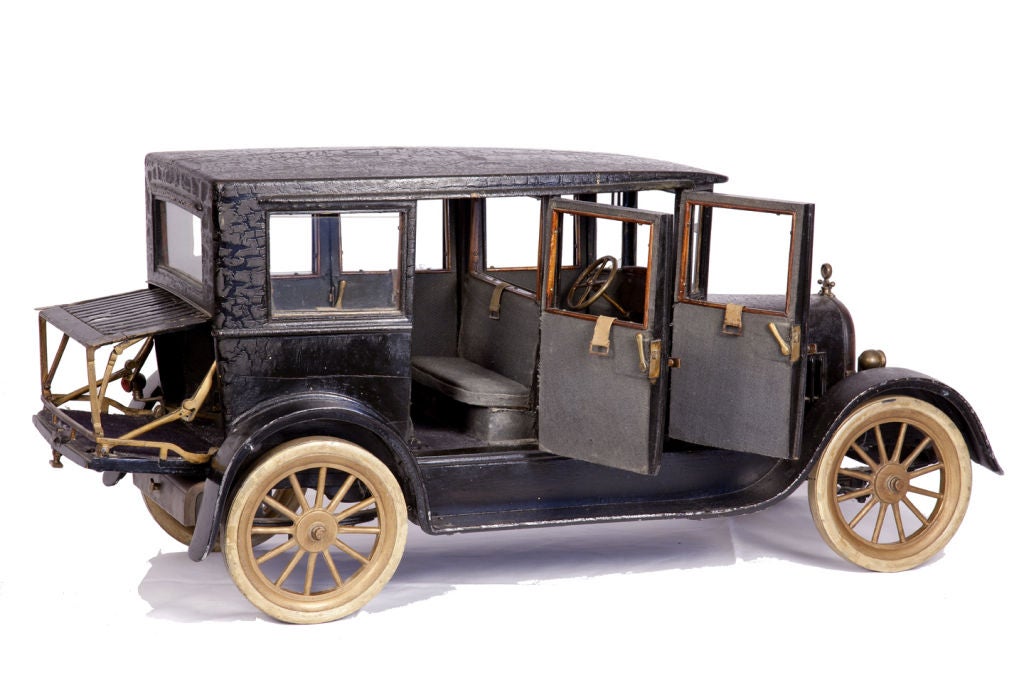 1926 Chrysler Model<br />
Wood, cast metal, rubber, glass and fabric.<br />
Complete with vintage photograph of actual model listing first four owners dating from 1927-1975. All orignal condition.