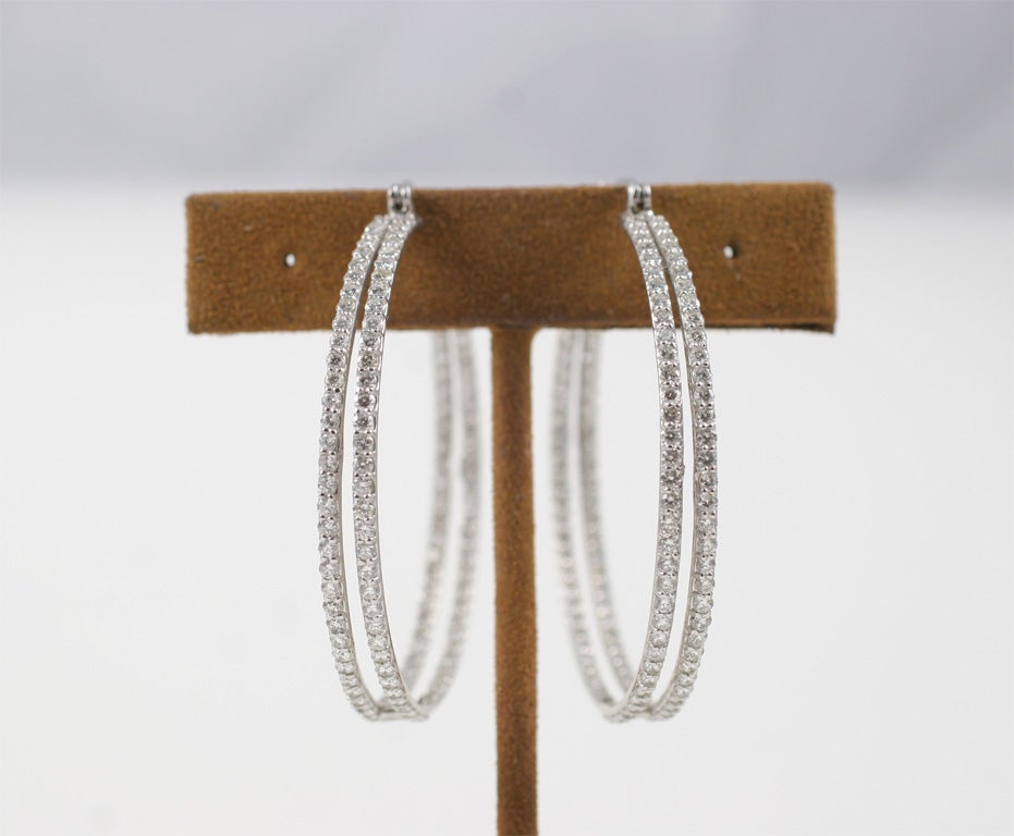 Large pair of double row diamond hoop earrings, 7 cttw

Also available in small & medium sizes.