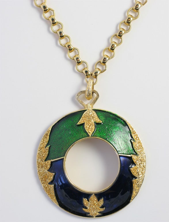 Large gilt and enameled ring pendant necklace.