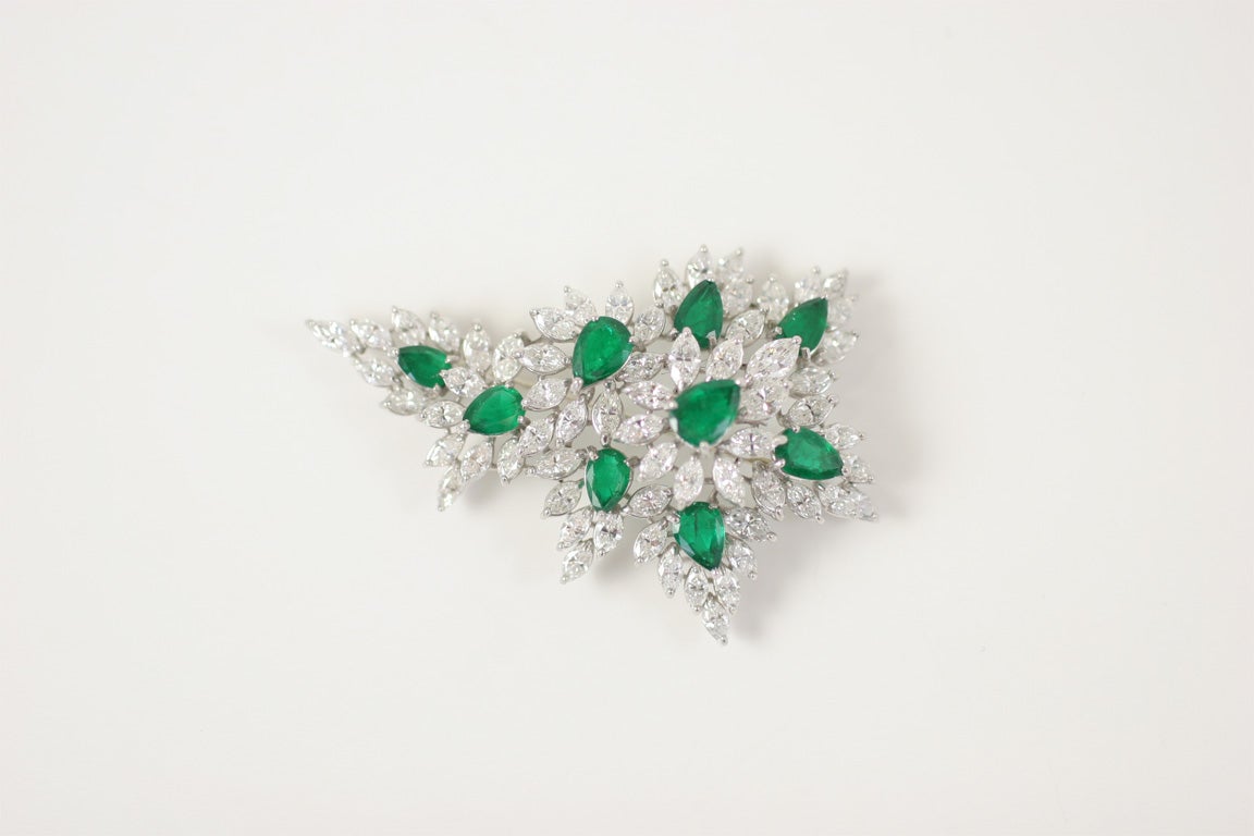 platinum Marquise diamond  and pear shape Emerald brooch <br />
59 marquise cut diamonds 12.50 caarats<br />
9 emeralds 12.00 carats