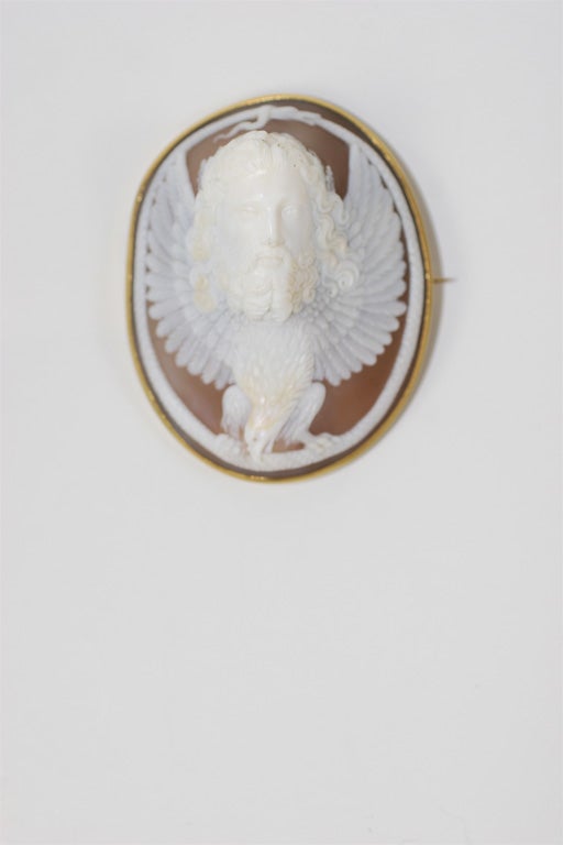 High relief Cameo of exquisite quality, representing Zeus above his symbol of the Heavens, the Eagle, battling the Snake grasping his tail and representing which , in turn, represents  Victory.  A very esoteric Iconography appealing to the