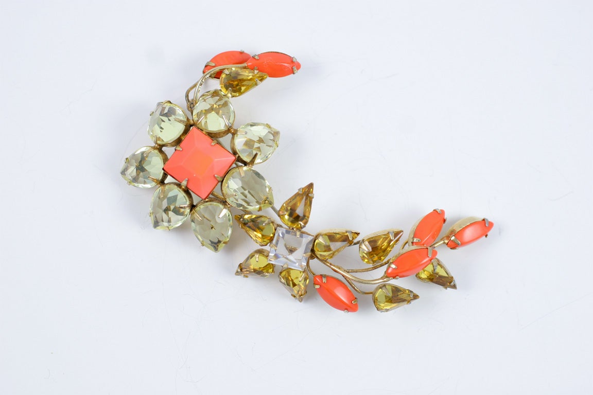 Rare handmade Schreiner brooch consisting of faceted pear shaped Czechoslovakian clear and light topaz colored crystals and coral colored stones.