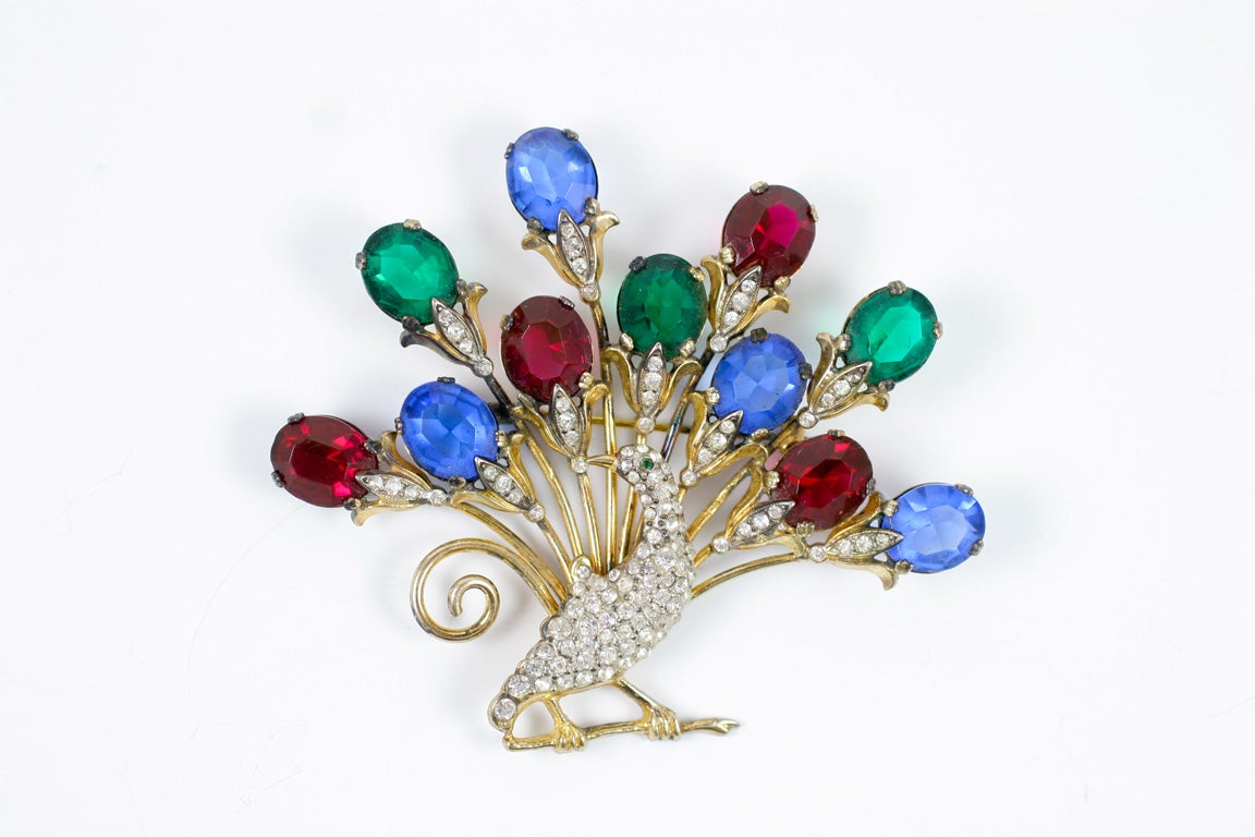 Sterling silver peacock brooch with gold wash.