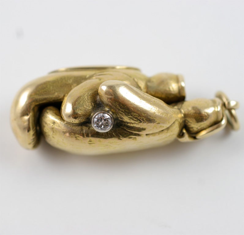 golden gloves pendant