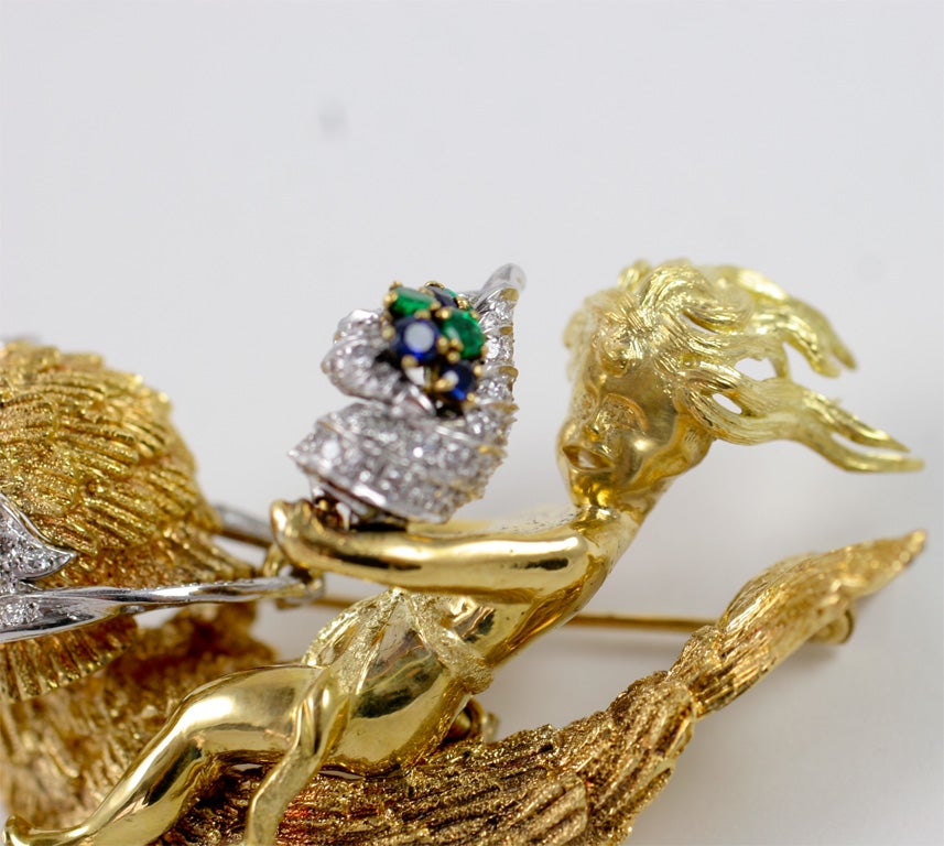 Golden Boy Riding on a Dolphin Brooch For Sale 1
