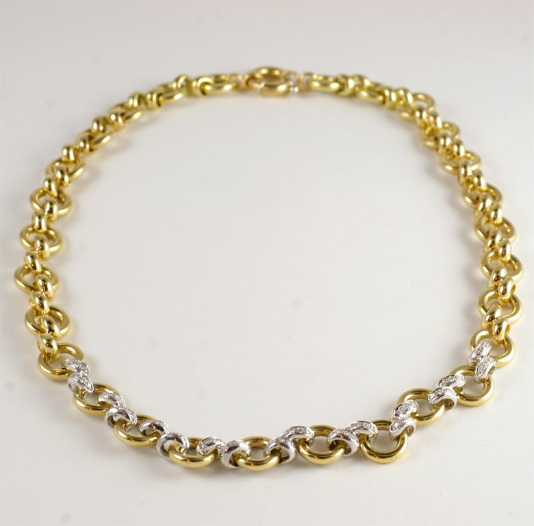 Elegant Yellow Gold circles with center connected by White Gold & Diamond connectors. High style. 17 1/2