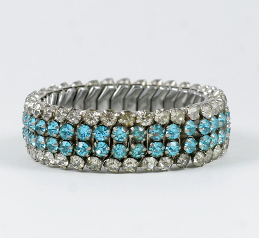 1940's stretch metal bracelet of clear and turquoise rhinestones.