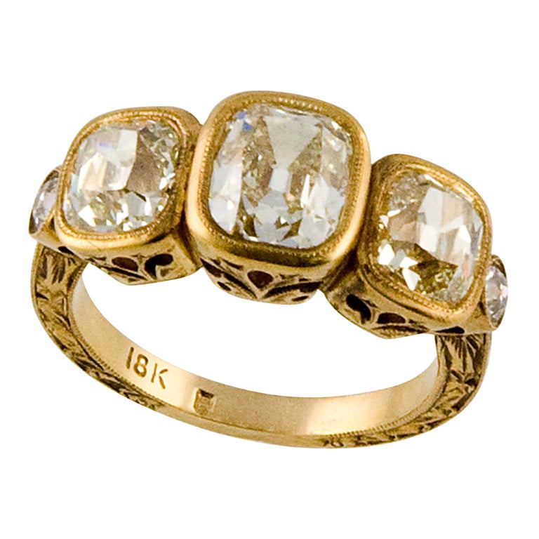 VINTAGE CUSHION CUT THREE STONE RING at 1stDibs