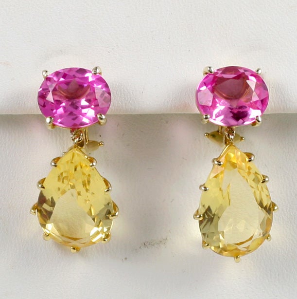 14 kt multi prong drop earing with pink topaz and citrine.  The earring measures 1 1/4