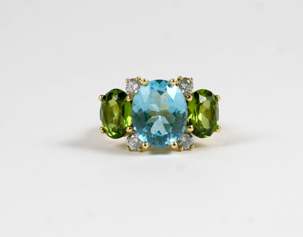 Women's Large 18kt Yellow Gold Gum Drop Ring with Blue Topaz and Peridot For Sale