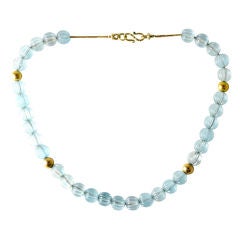 CARVED MELON SHAPED AQUAMARINE BEADS ON !8KT GOLD CHAIN