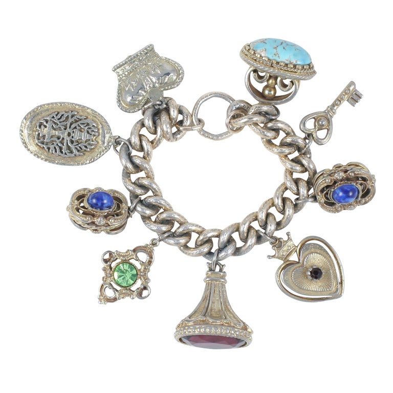 Silvertone Charm Bracelet For Sale at 1stdibs