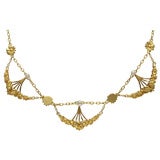 Three fans with flowers necklace