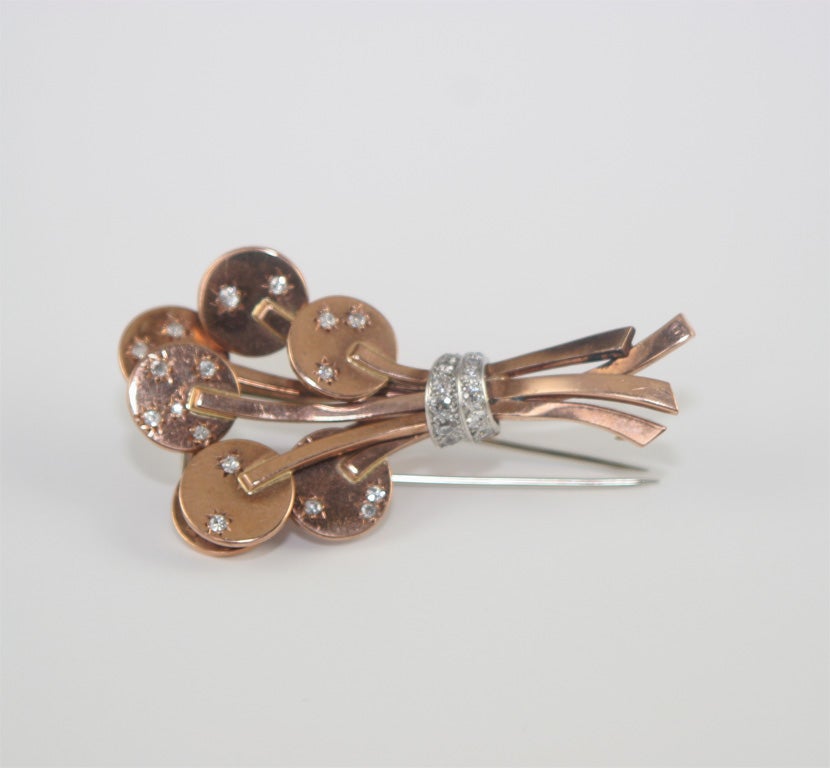 18k rose gold abstract clutch of baloons<br />
34 diamonds 1.00 carat   <br />
30.2 grams in original leather box