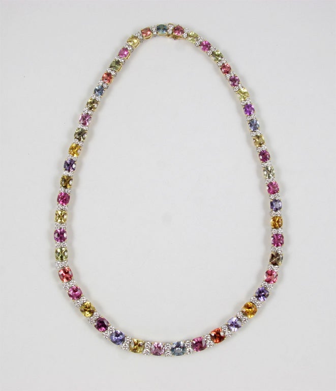 18k yellow gold necklace set with 48 fancy color sapphires 57.50 carats and 96 diamonds 7.25 carats