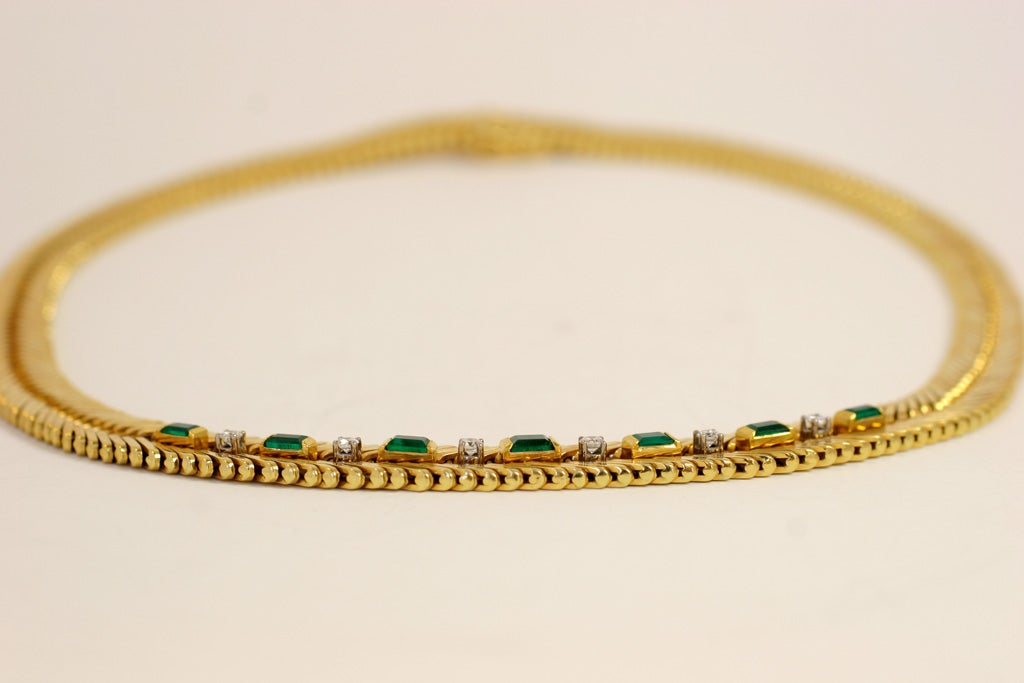 18k herring bone necklace 104.6 grams      7 emerald cut emeralds 3.50 carats, 6 diamonds 0.60 carats