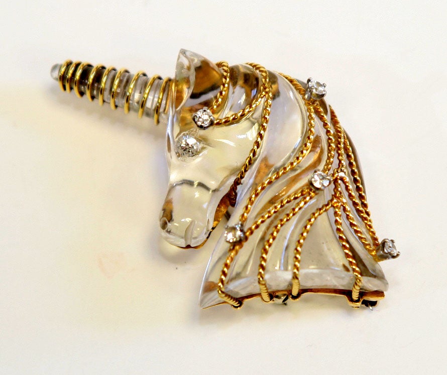 Carved crystal and 14k yellow gold wire unicorn brooch