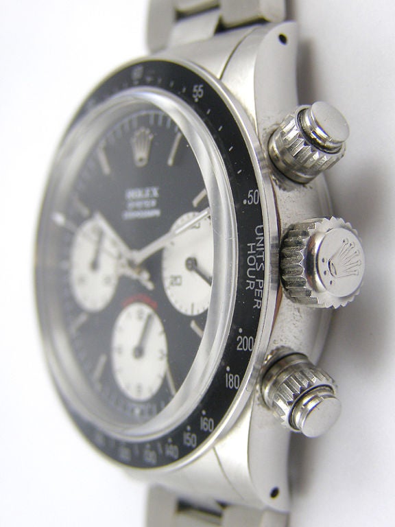 Rolex SS Daytona ref # 6263 serial #6.39 million. Rolex warrantee papers show the watch was imported to the U.S. by Rolex USA in May of 1984. Rolex warrantee papers correctly bearing original typed serial number and model # and retailer name. Black