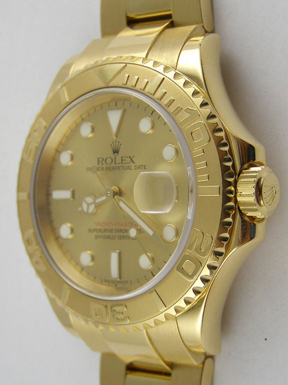 Rolex 18K YG Yachtmaster ref #16628 40mm diameter case F8 serial # circa 2008 with matte gold dial with large superluminova indexes and hands, rotating elapsed time 18K YG bead blast finish bezel, calibre 3135 self winding movement with sapphire