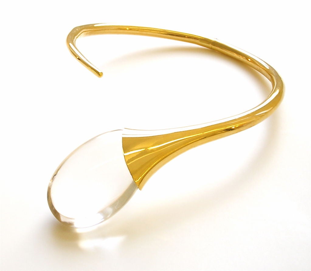 A rare and interesting necklace by Illias Lalaounis. The 18k yellow gold choker suspending a 2