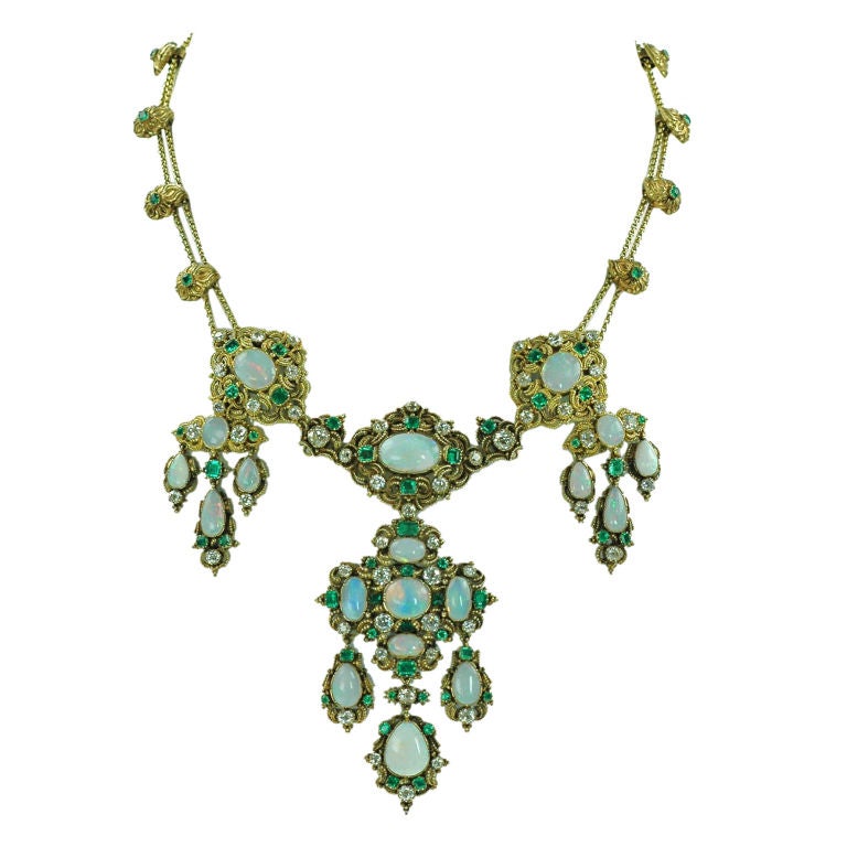 An exquisite regency opal emerald and diamond necklace