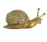 Diamond Gold Snail Pin by MAUBOUSSIN Paris.